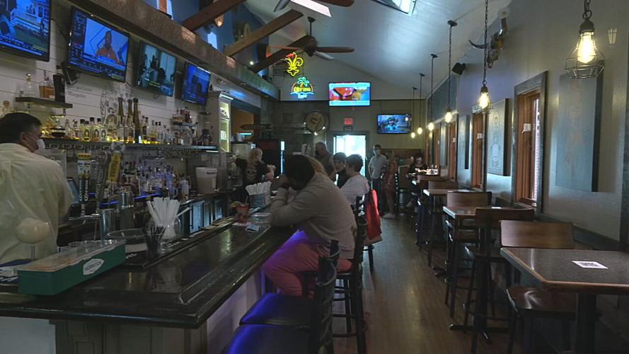 People sit at the bar at Ramiro's Cantina on Frankfort Ave..jpeg