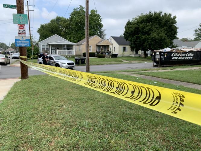 LMPD officers outside home in Louisville's Chickasaw neighborhood