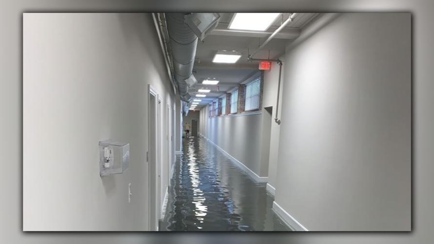M. Fine on Spring apartments flooded hallway