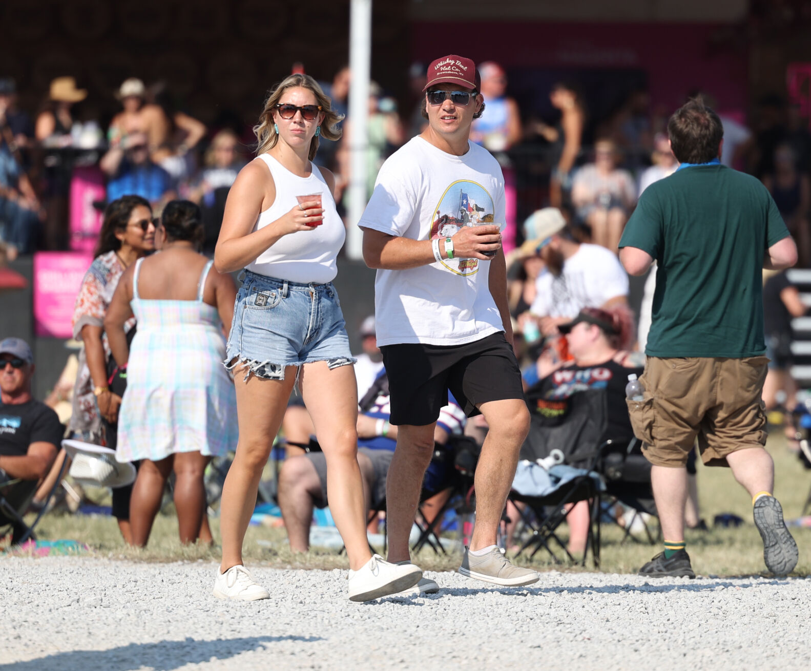 People walk at Bourbon and Beyond