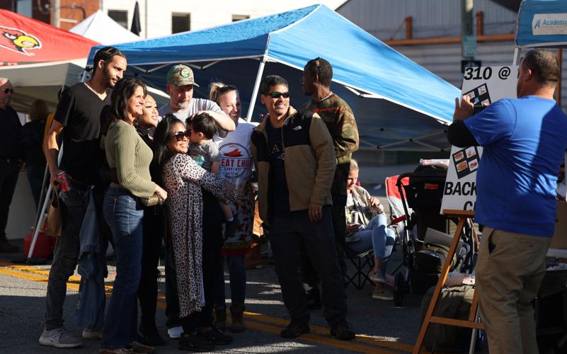 Louisville's Great Chili Cook off - family takes photo.JPG