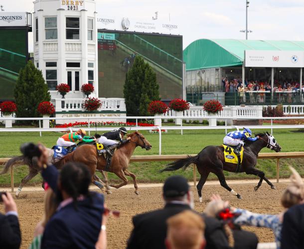 Horses close to finish line at Churchill Downs.JPG