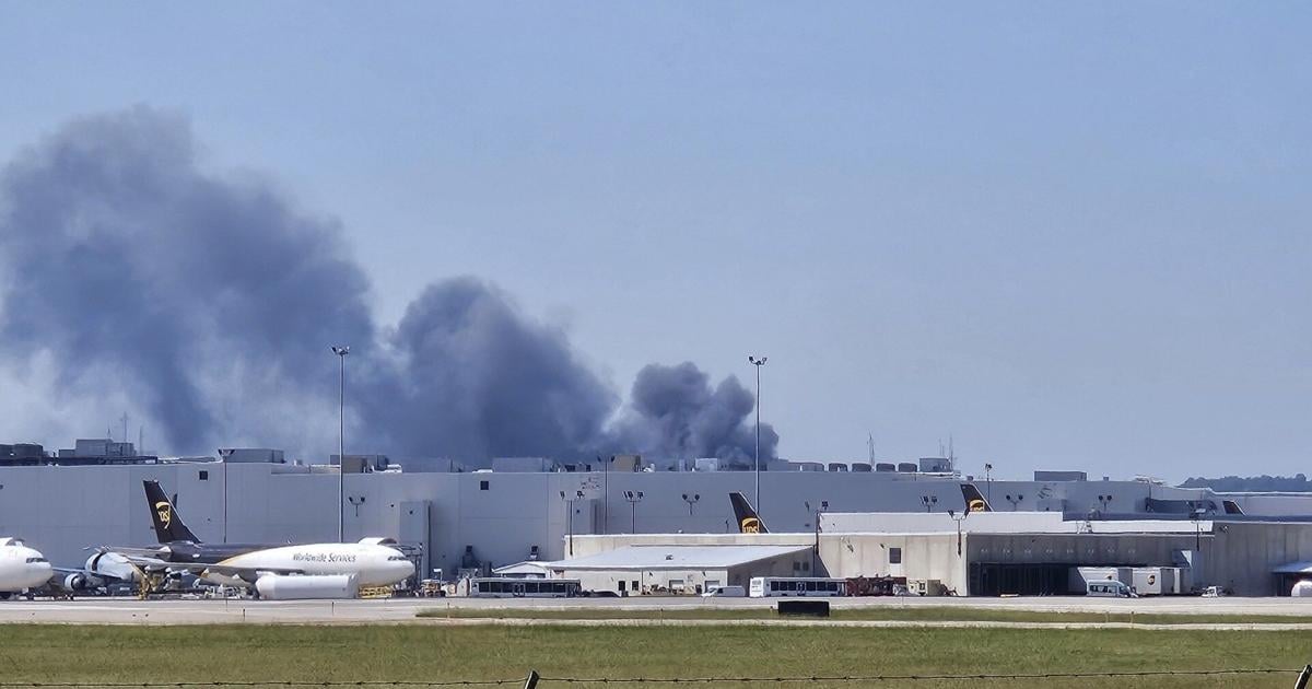 Docking bay fire at Louisville business sends cloud of smoke over area