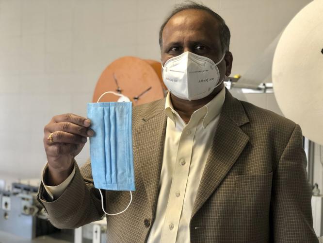 UofL N95 masks on a man.jpg
