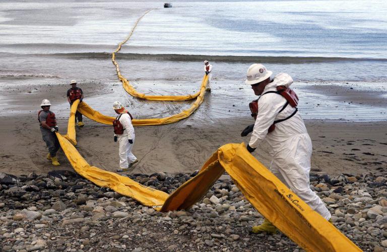 Oil containment boom AP photo.jpeg
