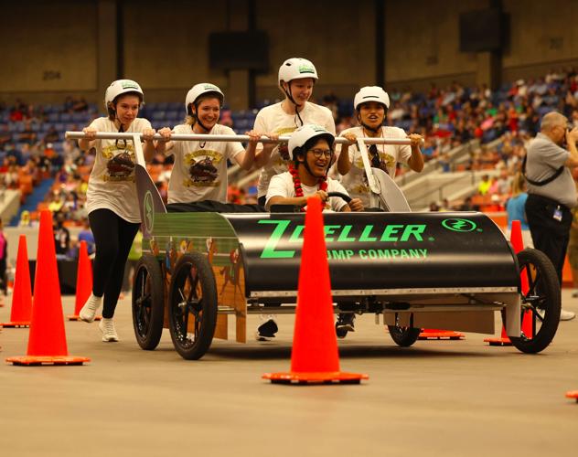 Team runs in the Bed races.JPG