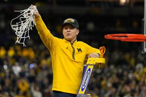 Mavericks are hiring national champ coach Dusty May away from Michigan, AP source says