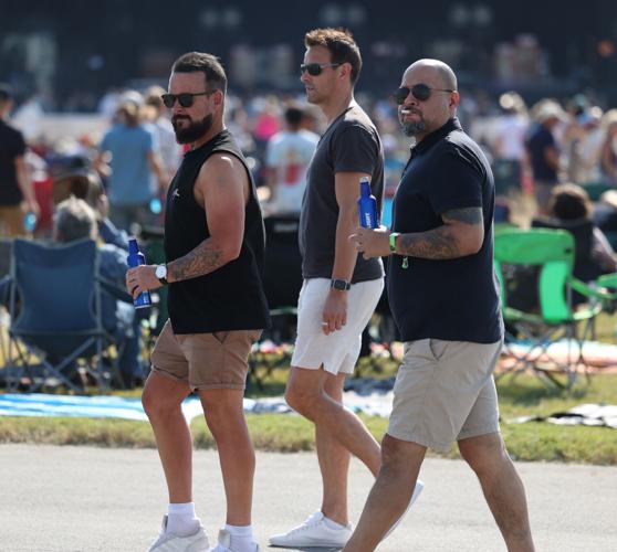 Three men walking at Bourbon and Beyond