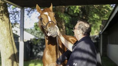 Rich Strike and trainer