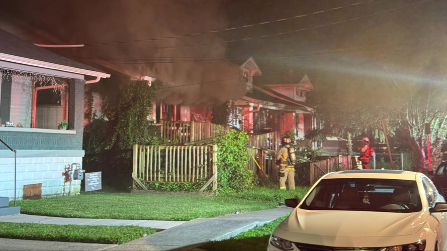 Fire crews battle fire on Beecher Street in Louisville