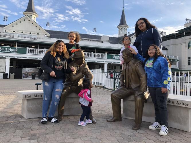 Louisville woman adopts six biological sisters from Hardin County