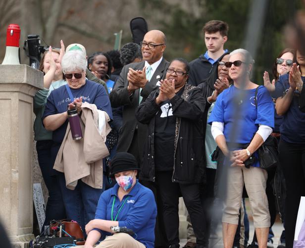 People clap in group during March on Frankfort.JPG