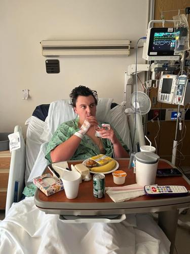 Tyler Morrison in hospital bed after lightning strike