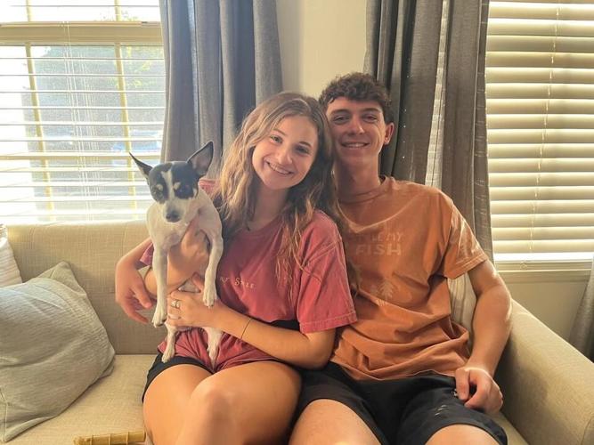 Riley Morrison poses with his girlfriend