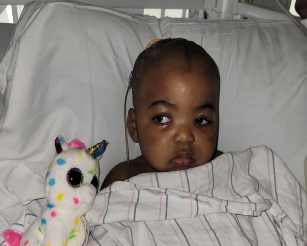 Ocean Robertson with stuffed animal