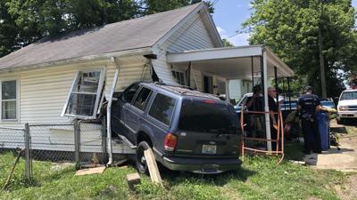 Vehicle crashes into house in Lexington