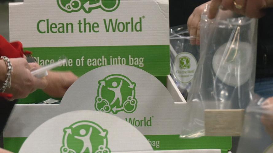 UPS employees packing hygiene kits for the homeless on April 19, 2022