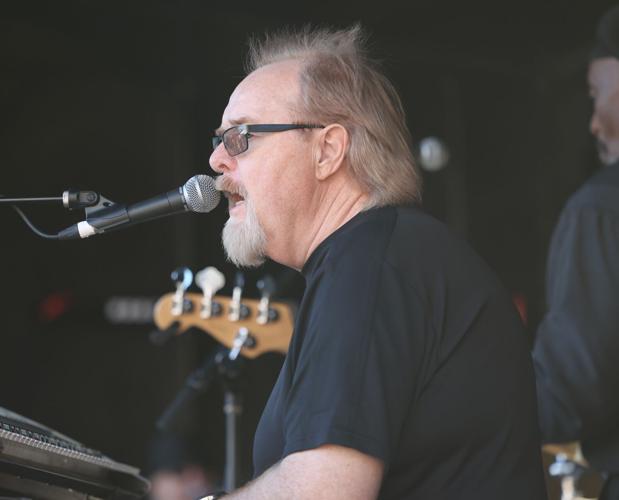 Louisville's Great Chili Cook off - band singer performs.JPG