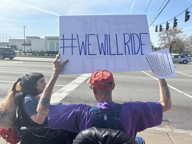 Close to one dozen people gathered to protest TARC Monday