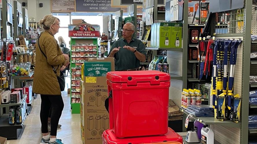 Jim Lehrer with customer