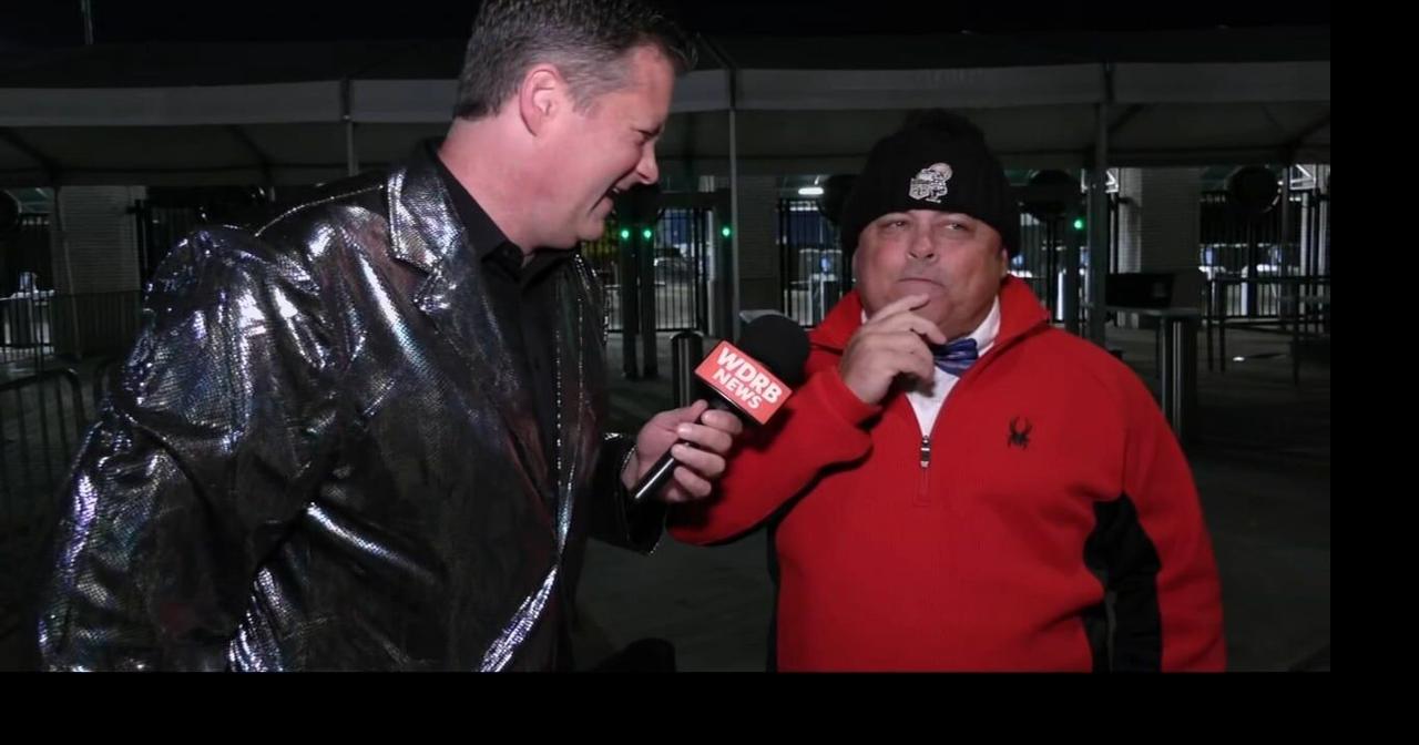 Keith Kaiser talks to the first person in line at Churchill Downs for the Kentucky Derby
