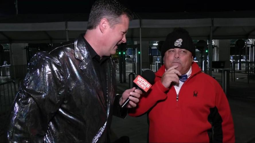 Keith Kaiser talks to the first person in line at Churchill Downs for the Kentucky Derby