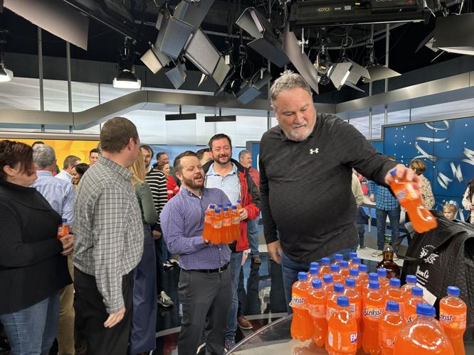 Dave White arranges his Sunkist.JPG
