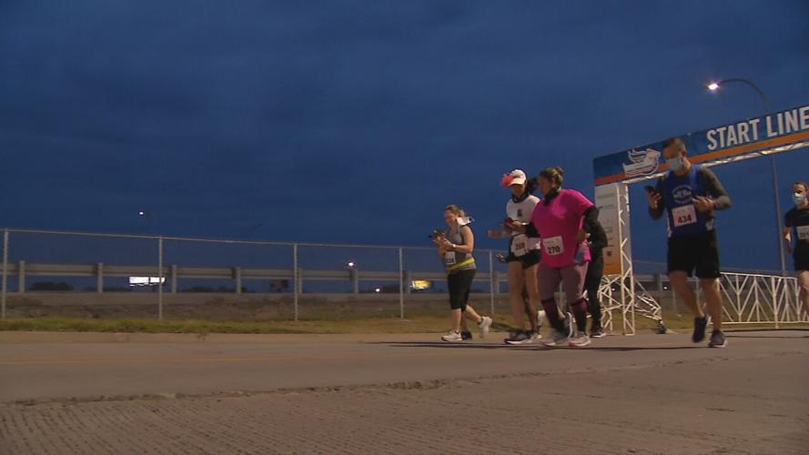 Runners participate in the Humana Kentucky Derby Festival Marathon