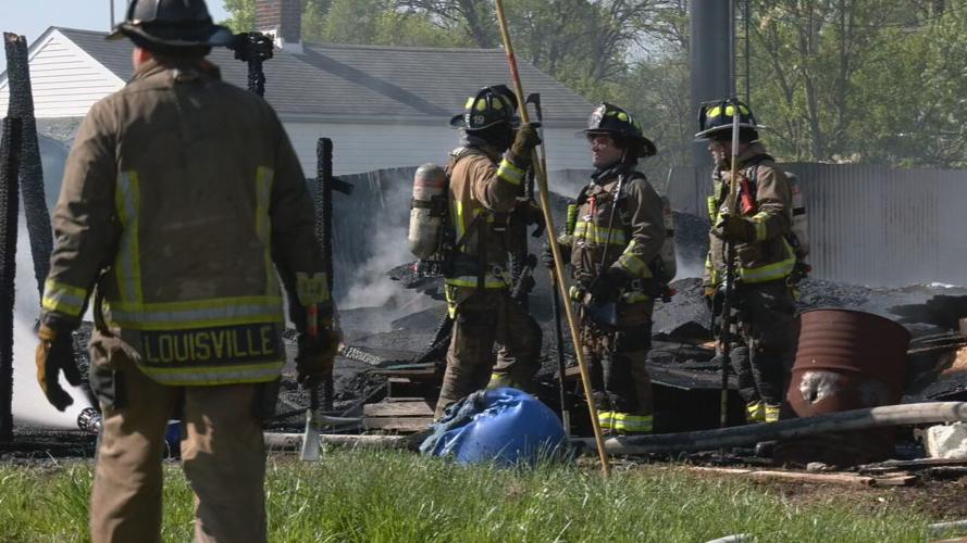 Louisville firefighters near scene of garage fire in Portland neighborhood