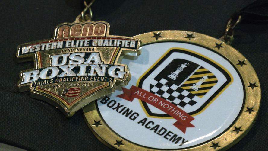 13-year-old Louisville boxer fights past to come out on top