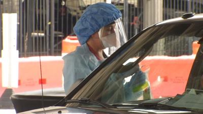 Health worker at UofL Health's downtown Louisville testing site