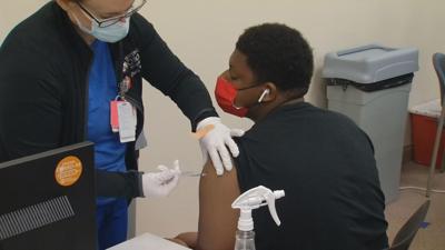 Youth receiving COVID-19 vaccination at Norton Healthcare's Breckenridge Lane clinic