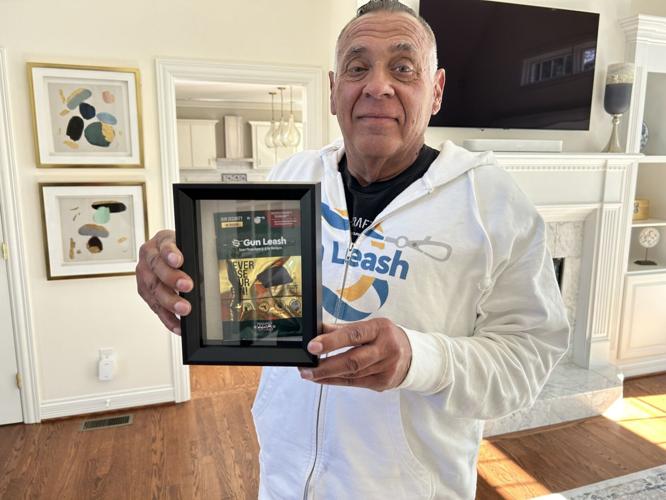 Carl Lanore with app.jpg