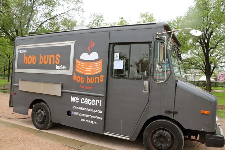 Crews set up booths along the Ohio River one day before Thunder Over Louisville 2023