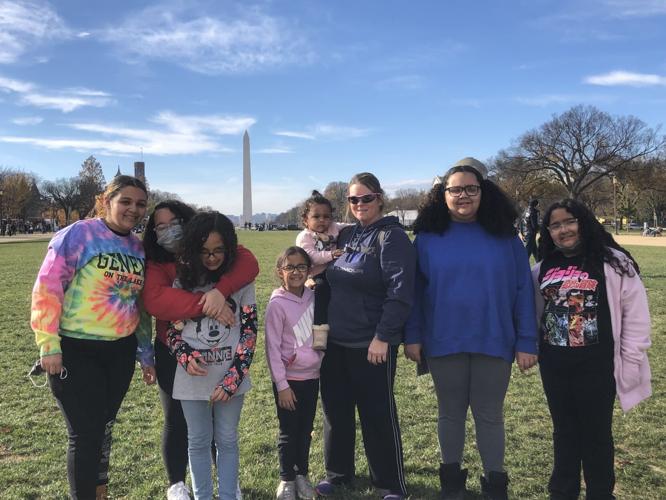 Louisville woman adopts six biological sisters from Hardin County