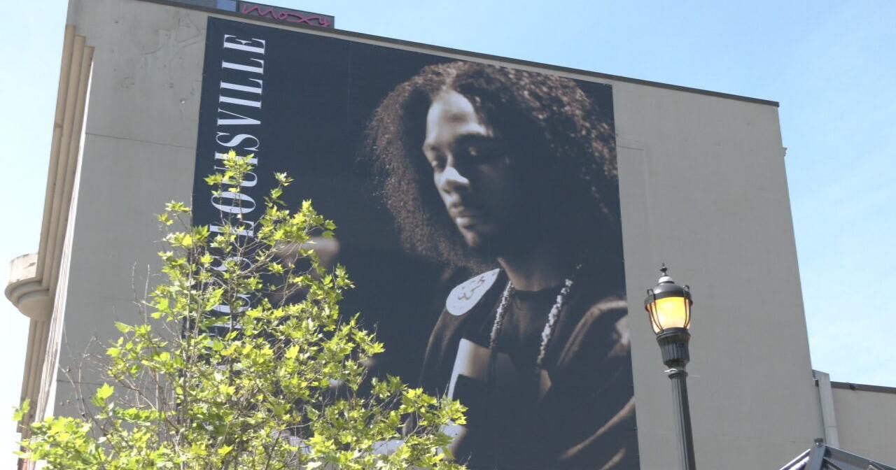 Hometown Hero banner unveiled for Static Major in downtown Louisville - Vimarsana News