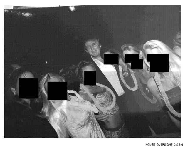 Epstein Files - Donald Trump stands near group of women