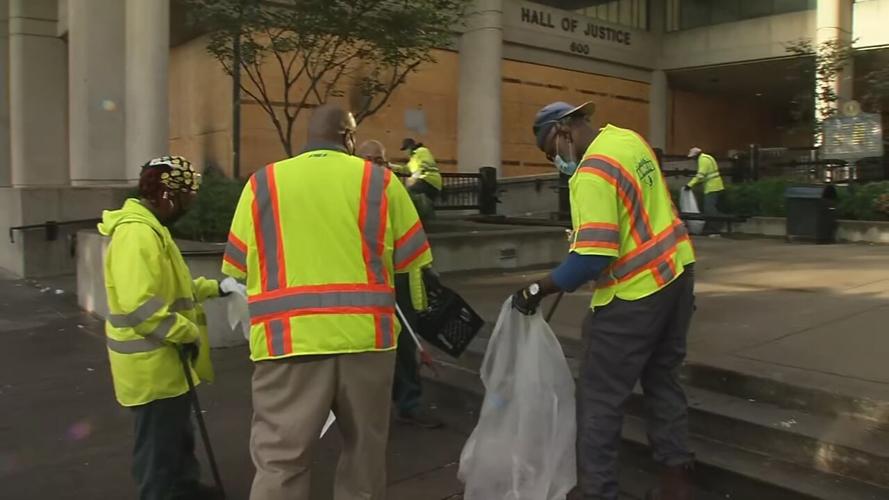 LOUISVILLE WORKERS CLEAN UP AFTER PROTEST AND FIRES DOWNTOWN - 9-24-2020  (1).jpeg