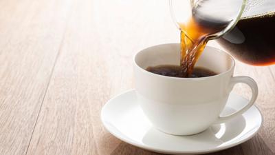 Coffee poured into cup