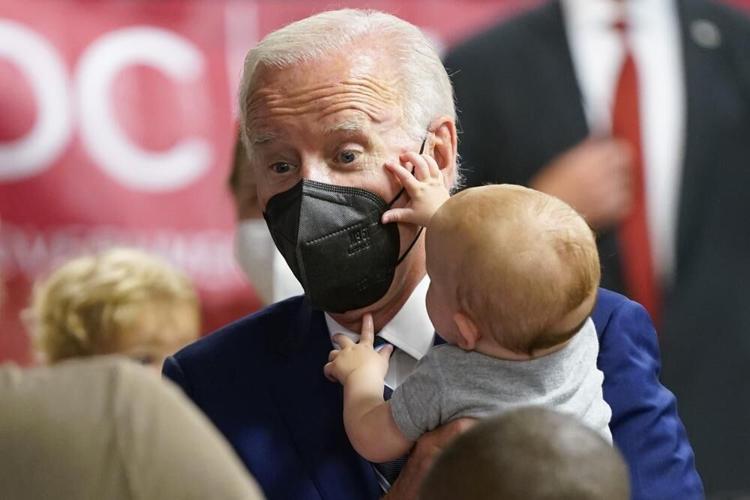 Joe Biden with baby in Washington