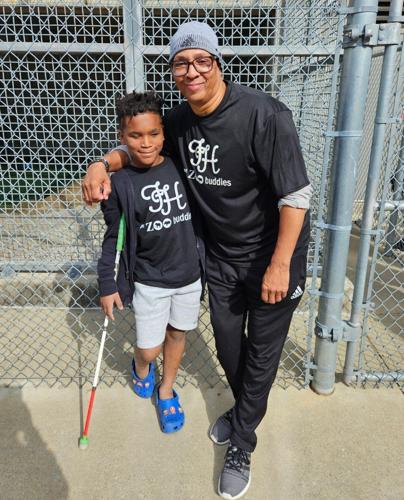 Malakai Roberts with Christopher 2x.jpg