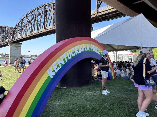 People pose for photos at Kentuckiana Pride Festival
