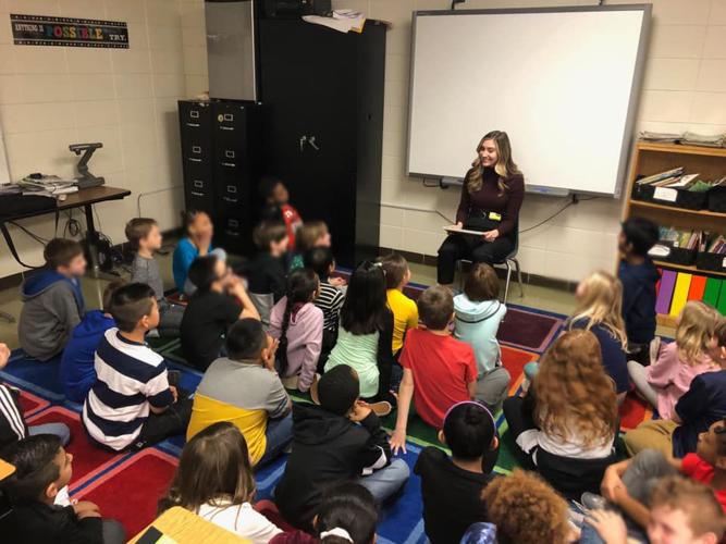 Hayden reads to JCPS kiddos.jpg
