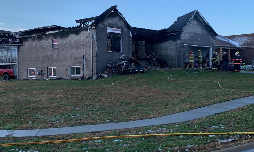 Mount Washington Firefighters in front of home