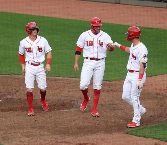 Joey Votto scores a run for Bats.JPG