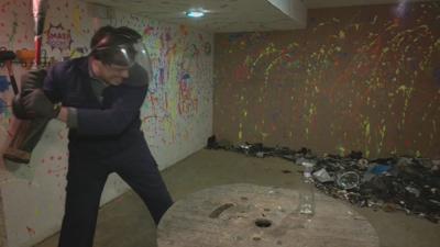 Keith Kaiser is excited to break stuff at Big 4 Escape & Smash Room.jpg