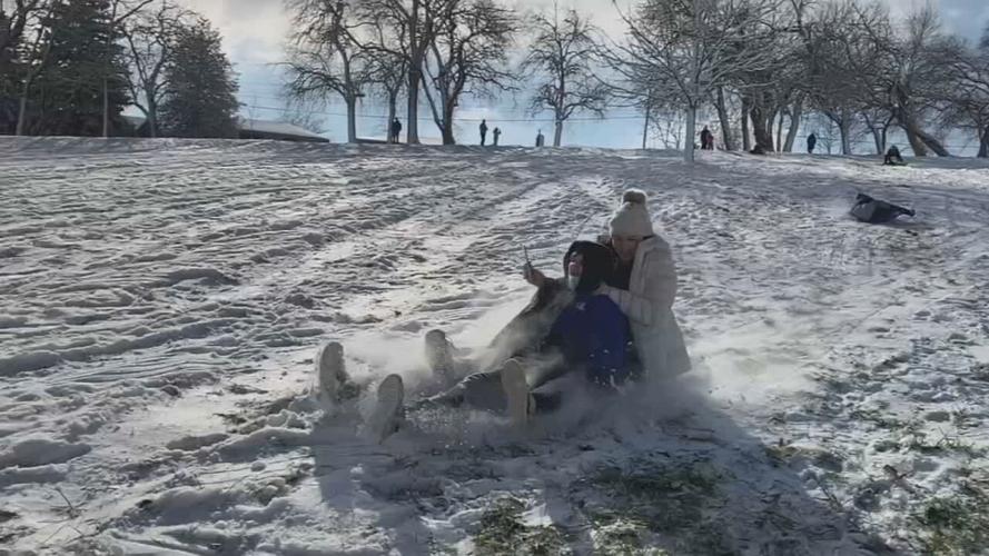 People sledding at a Louisville park (generic)