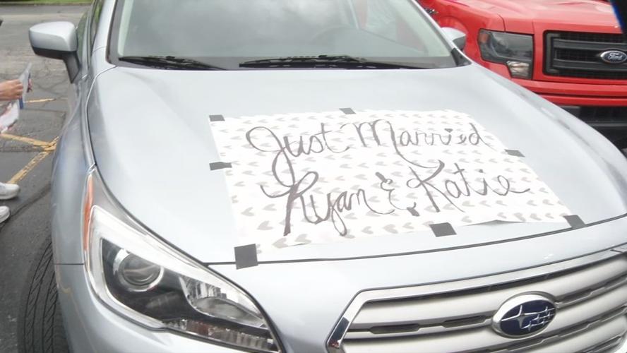 Car in wedding parade for Katie and Ryan Loveall