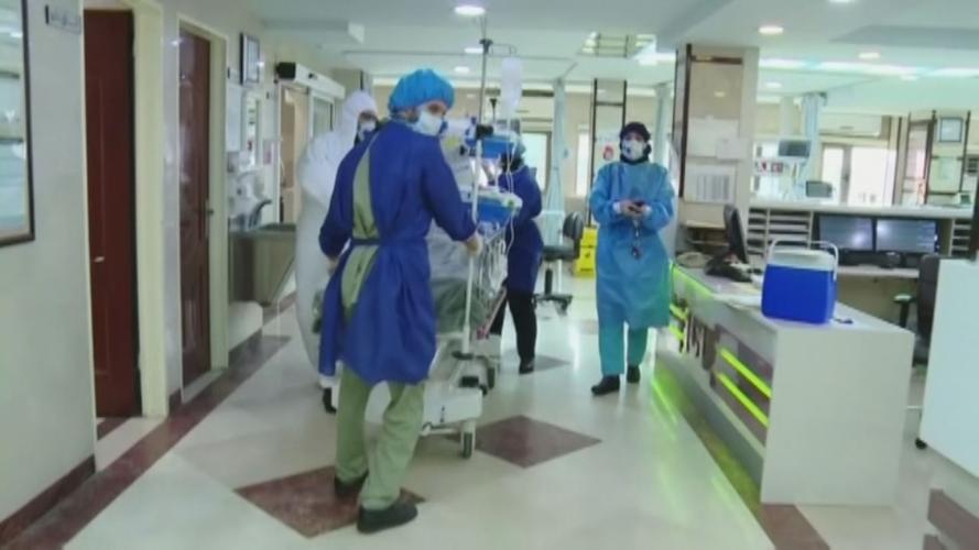 Hospital workers in protective gear.jpg