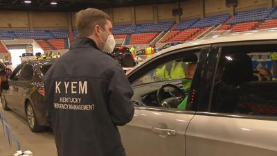 Gov. Beshear meets teacher being vaccinated at Broadbent Arena